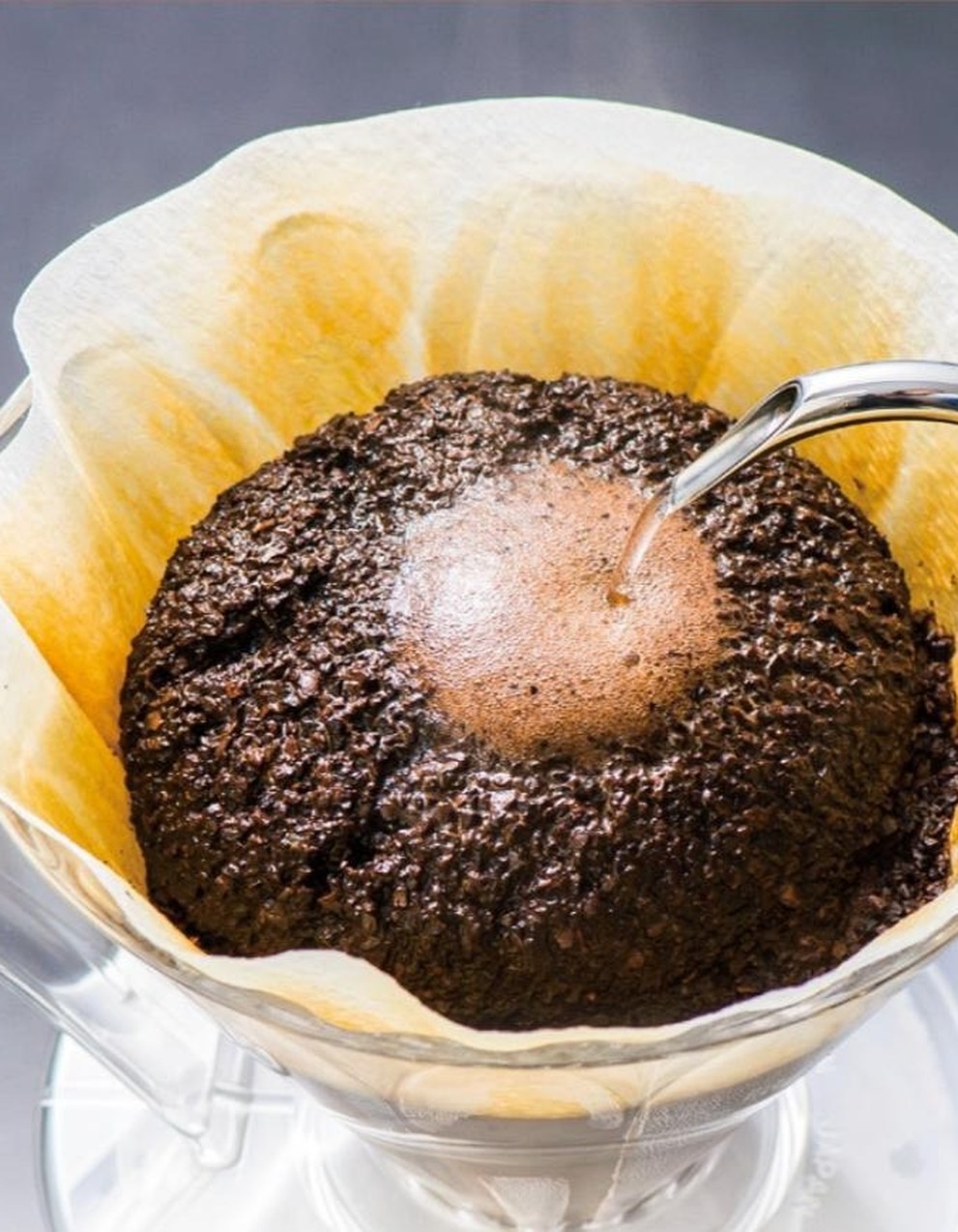 Hot pour-over coffee in a ceramic cup